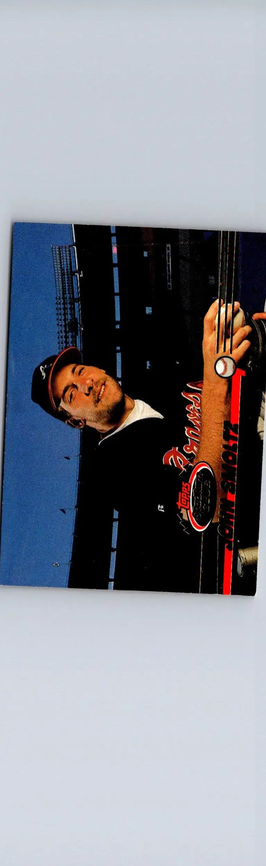 Baseball trading card featuring John Smoltz in black and red Stadium Club uniform