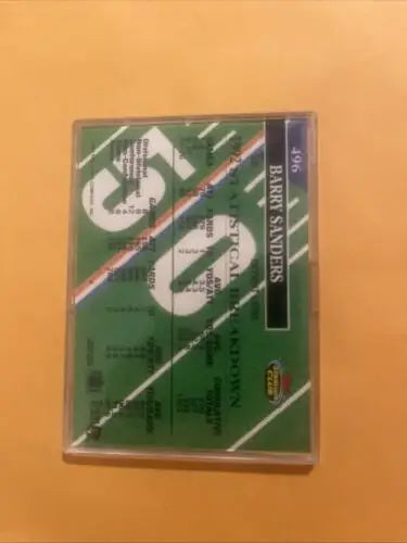 Barry Sanders 1993 Topps Stadium Club Members Choice football card displayed prominently