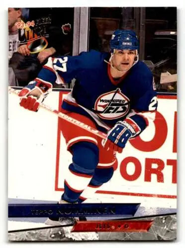 Hockey player in blue Winnipeg Jets jersey skating, Teppo Numminen Winnipeg card