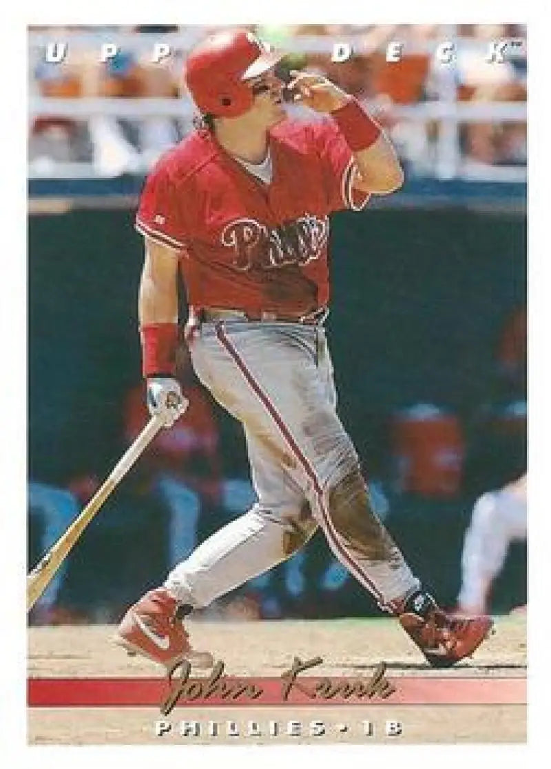 John Kruk in Philadelphia Phillies uniform completing a batting swing on baseball card