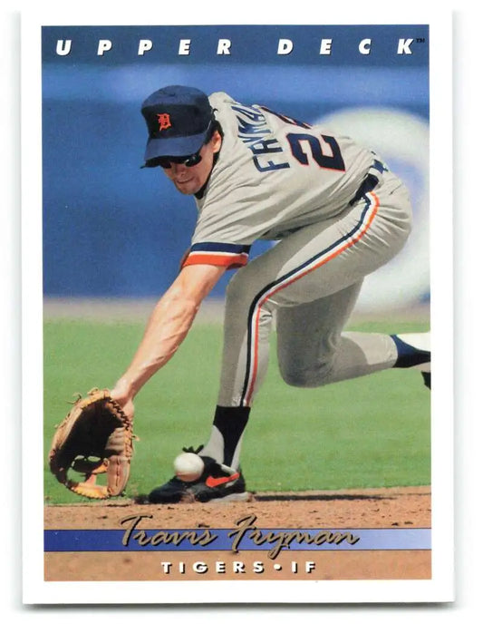 Baseball player Travis Fryman fielding a ground ball in Detroit Tigers uniform