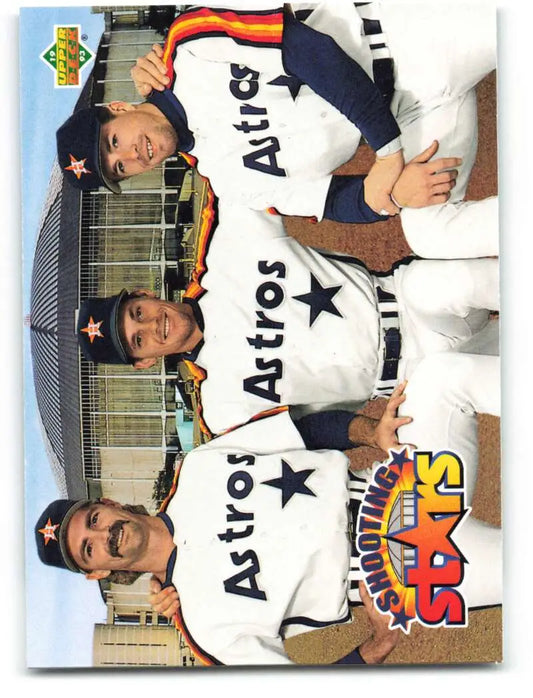 Three Houston Astros players in white jerseys featuring Doug Drabek, Craig Biggio, and Jeff Bagwell