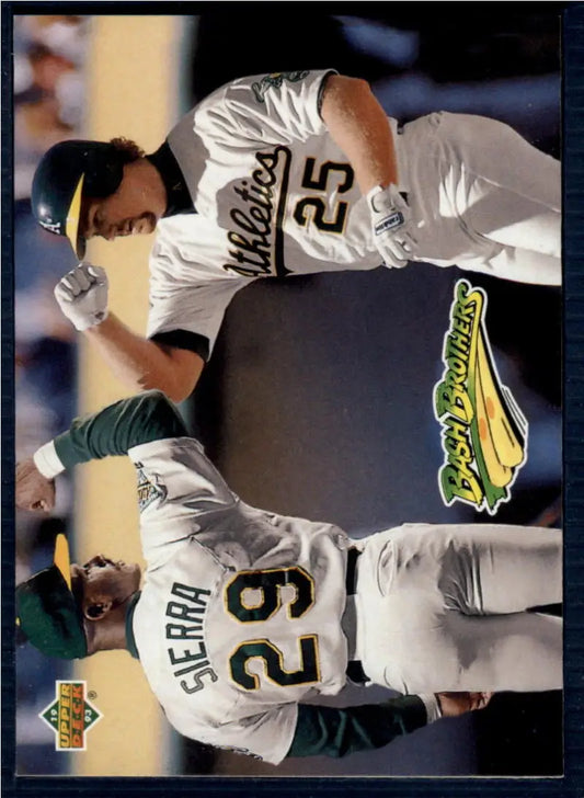 Baseball players Ruben Sierra and Mark McGwire in Oakland Athletics uniforms during a game