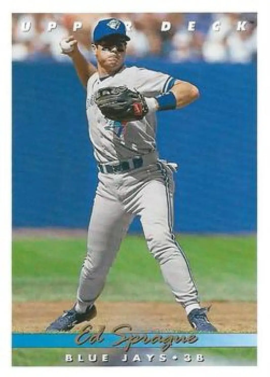 Toronto Blue Jays baseball card of Ed Sprague making a throwing motion in grey uniform