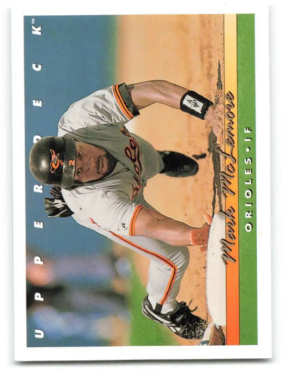 Baseball player in white Baltimore Orioles uniform sliding into base on Upper Deck card