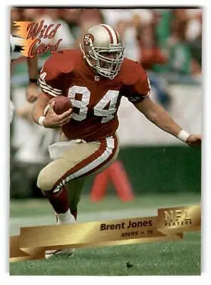 Brent Jones in action on the field, featured in 1993 Wild Card trading cards