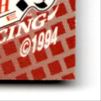 Red and white checkered finish line racing card with 1994 copyright for Racing Benny Parsons