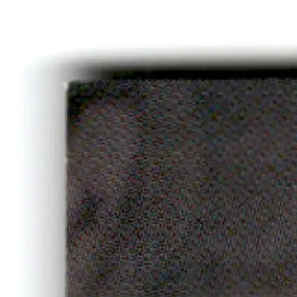 Corner of black textured fabric from 1994 Pro Set Power Dick Trickle #120