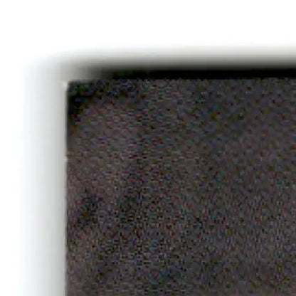 Corner of black textured fabric from 1994 Pro Set Power Dick Trickle #120