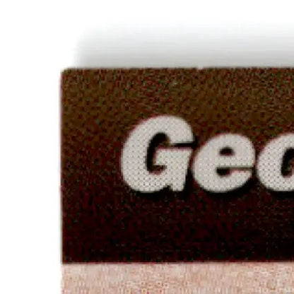 Brown rectangular object with Geo text from 1994 Pro Set Power Racing George Bradshaw #79