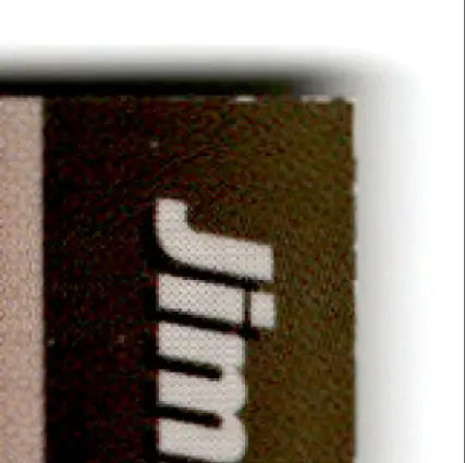 Dark brown textured fabric label with white lettering on 1994 Pro Set Power Racing Jimmy Spencer #118