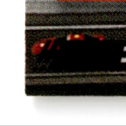 Miniature black sports car with red accents and light bar from 1994 Pro Set Power Racing Jimmy Spencer #118