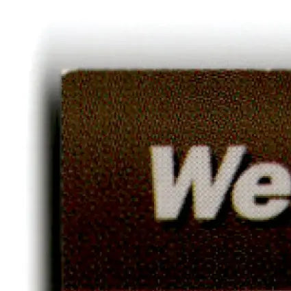 Brown textured card with white text from 1994 Pro Set Power Western Auto set power western