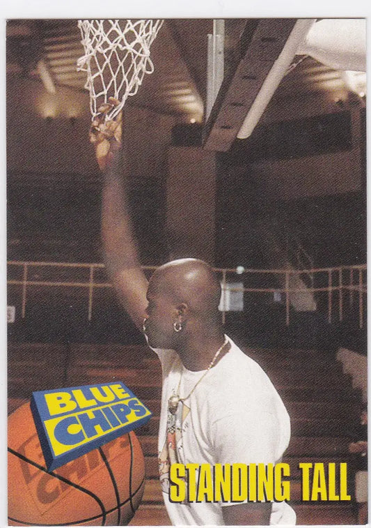Basketball player in white shirt dunking for 1994 Skybox Shaquille O’Neal Standing Tall Blue Chips