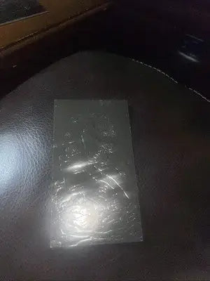 Rectangular glossy dark object from Skybox Superman Forged Steel FS3 Man of Steel Platinum Series
