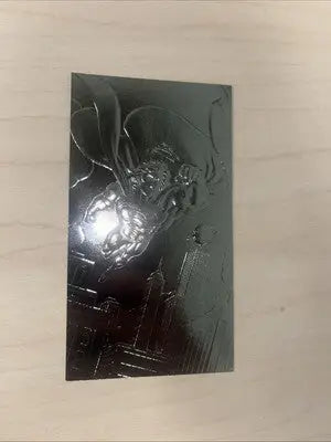 Embossed silver comic book card from Skybox Superman Forged Steel FS4 Man of Steel Platinum Series