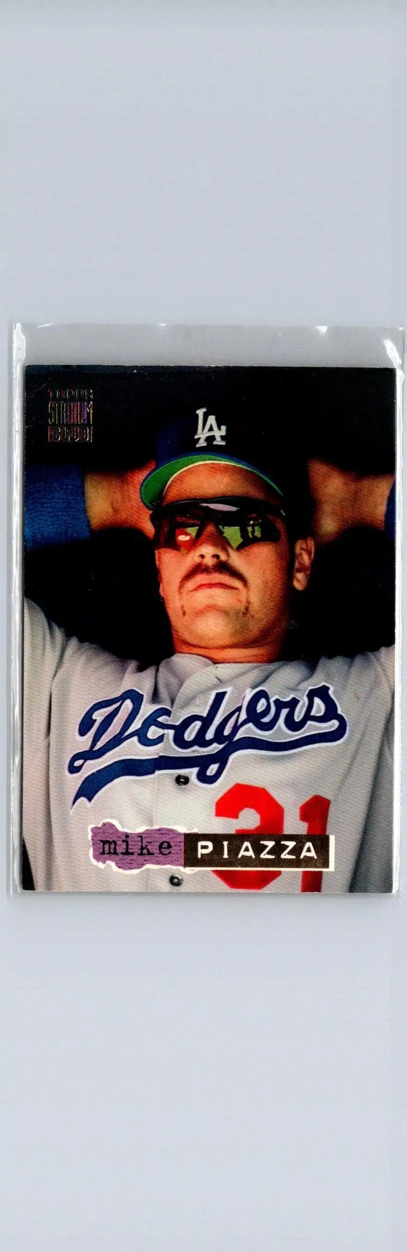 Baseball trading card of Mike Piazza in Dodgers uniform from 1994 Stadium Club Piazza Dugout Dirt