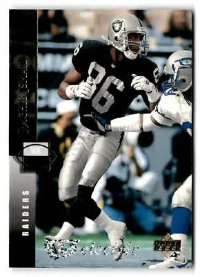 Football player in action featuring Raghib Ismail from Upper Deck Electric card