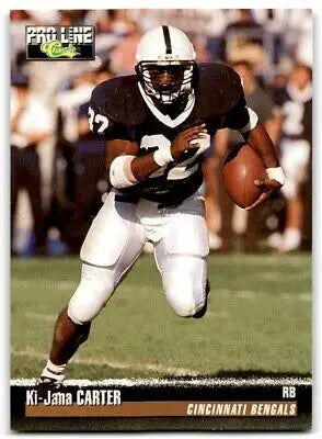 Football player in action from 1995 Classic Pro Line Ki-Jana Carter Rookie card