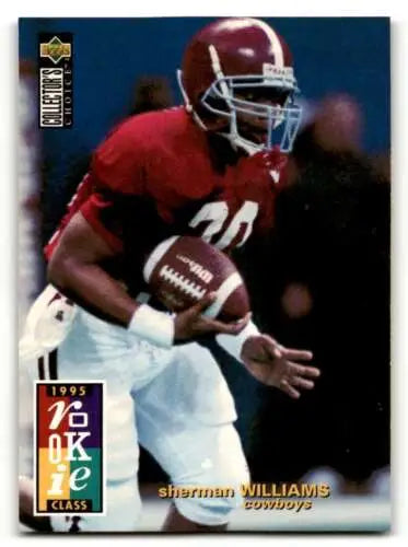 Football player holding a football from 1995 Collector’s Choice Sherman Williams Dallas Cowboys