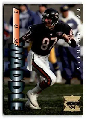 Football player in action featuring Tom Waddle Gold logo from 1995 Collector’s Edge card