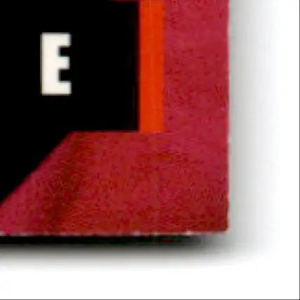 Corner of a red and black finish line Geoff Bodine #7 box for collectible racing memorabilia