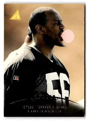 Football player Pat Swilling blowing bubble gum on 1995 Pinnacle trading card