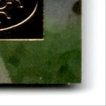 Dark green jade piece with gold-edged black inset from Pinnacle Football Steve Young card