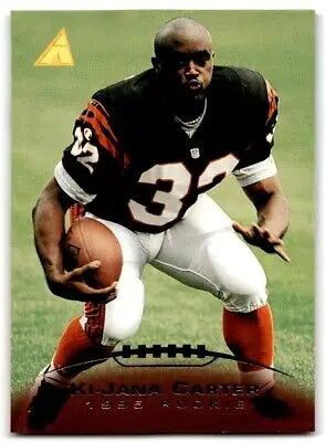 Football player Ki-Jana Carter with ball from 1995 Pinnacle Cincinnati Bengals card