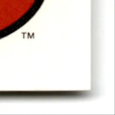 White paper with red and black circular design and TM symbol for 1995 Score Football Steve Young San Francisco 49ers