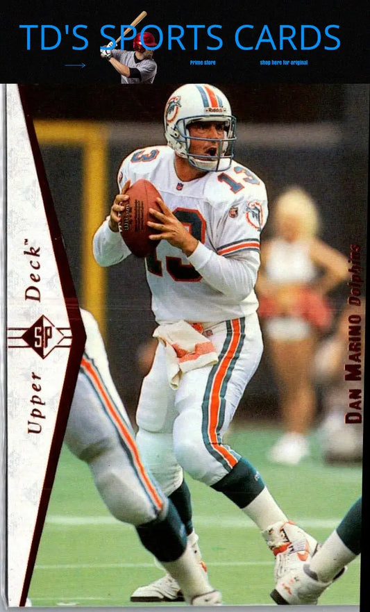 Vertical sports card featuring Dan Marino in a white uniform holding a football