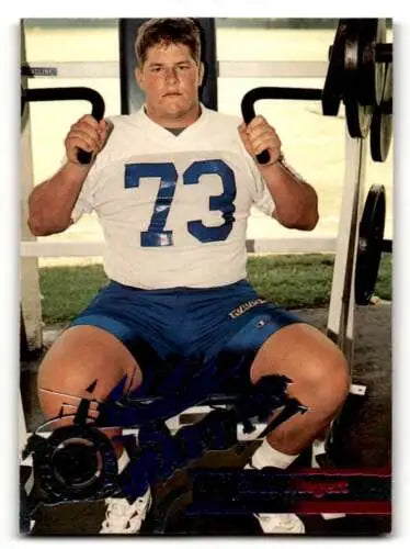 Football player training on weight machine for D438 Zach Wiegert Louis Rams Football card