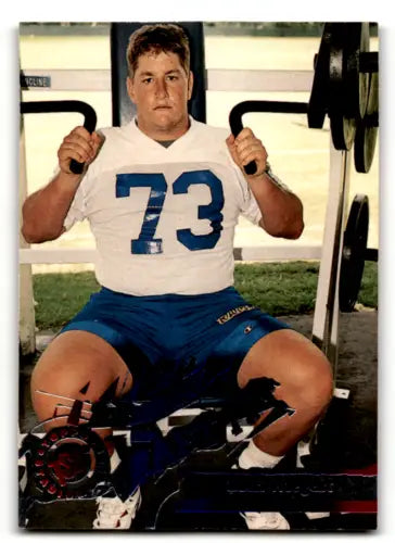Football player on exercise machine for 1995 Topps Stadium Club D438 Zach Wiegert card