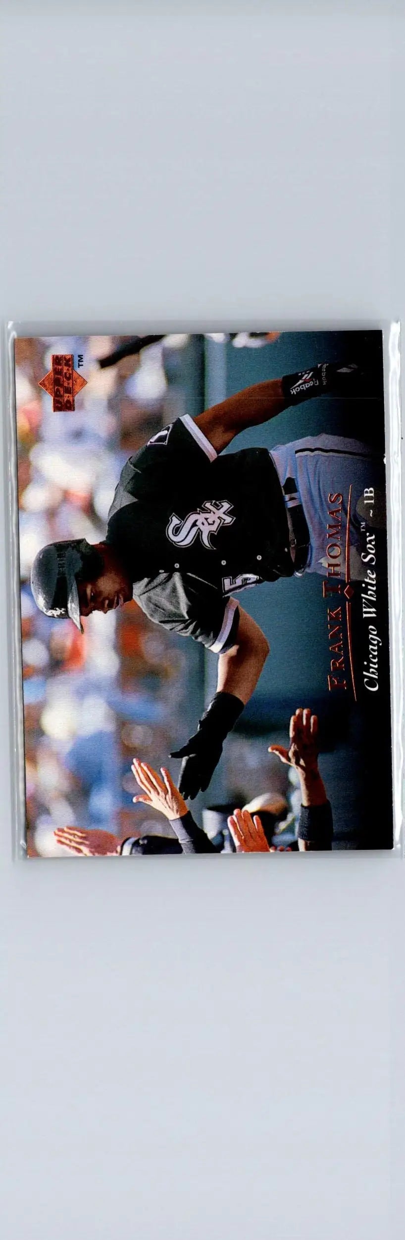 Baseball trading card featuring Frank Thomas in black and white uniform from 1995 Upper Deck