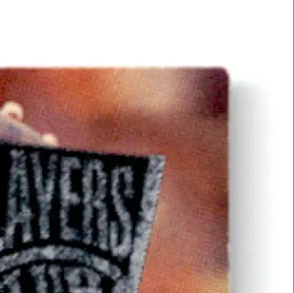 Textured reddish-brown corner of a 1995 Upper Deck Choice Steve Young Player’s Club card