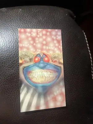 Creepy clown trading card from 1995 Wildstorm Wide Vision Spawn collection