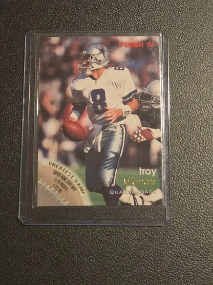 Collectible 1996 Fleer Troy Aikman football trading card in Dallas Cowboys uniform