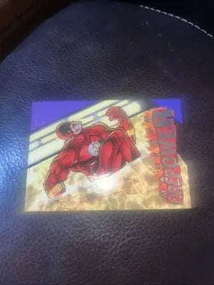Flash clears the blast zone on 1996 Fleer DC Outburst Firepower Maximum comic card