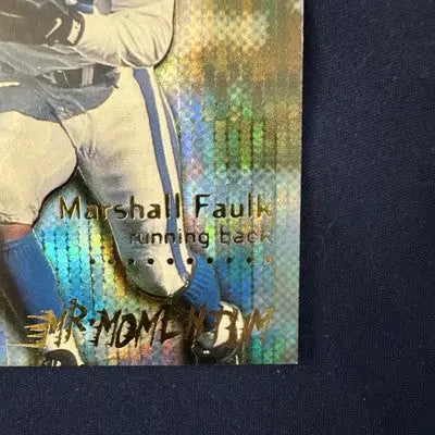 Holographic football trading card of Marshall Faulk featuring Light Blue Pulsar design from Fleer Ultra
