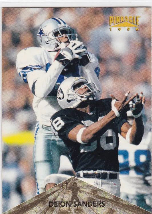 1996 Pinnacle Deion Sanders Dallas Cowboys football card with Raiders player foreground