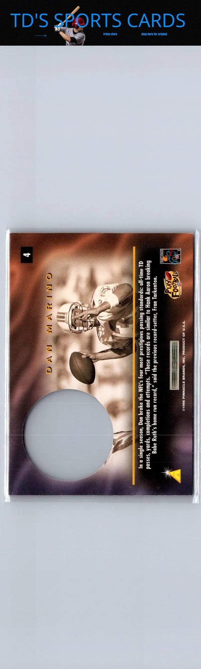 Back of 1996 Pinnacle Mint Dan Marino football trading card with circular cutout
