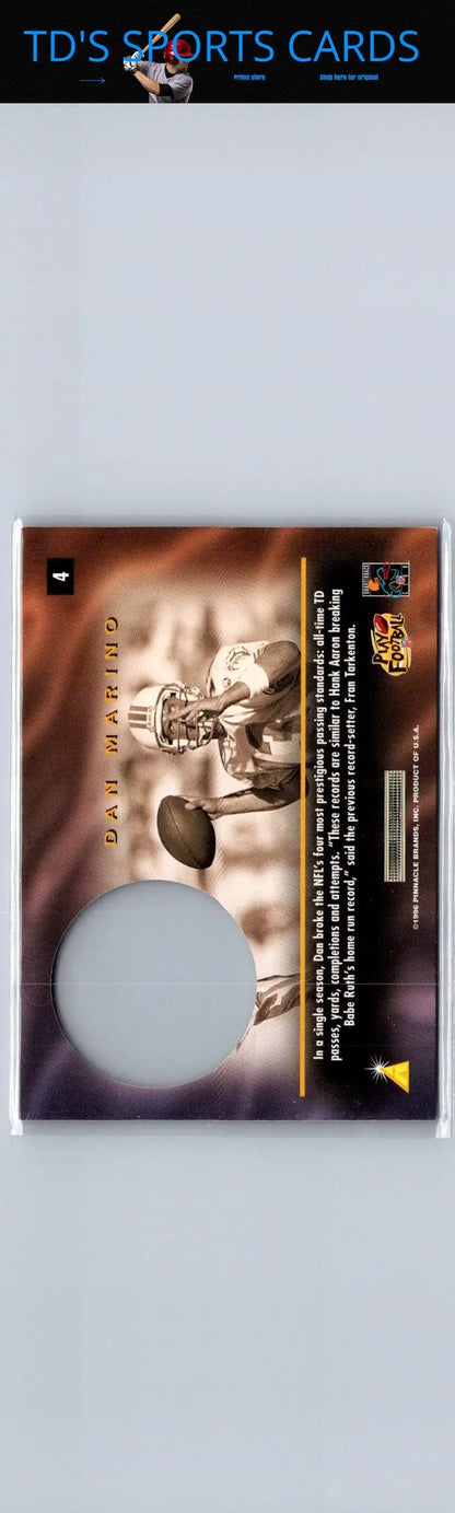 Back of 1996 Pinnacle Mint Dan Marino football trading card with circular cutout