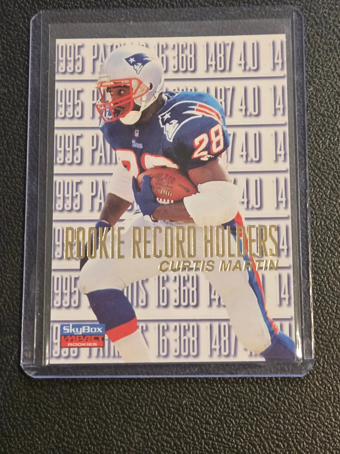1995 SkyBox Impact Rookies Curtis Martin football rookie card displayed in 1996 SkyBox Impact Rookies product