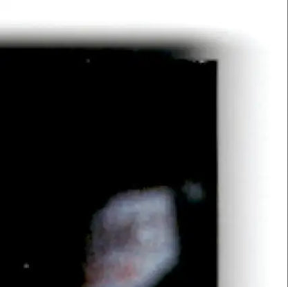 Close-up of blurred object on black background with white border for 1996 Upper Deck Racing Road to the Cup Brett Bodine #RC19a