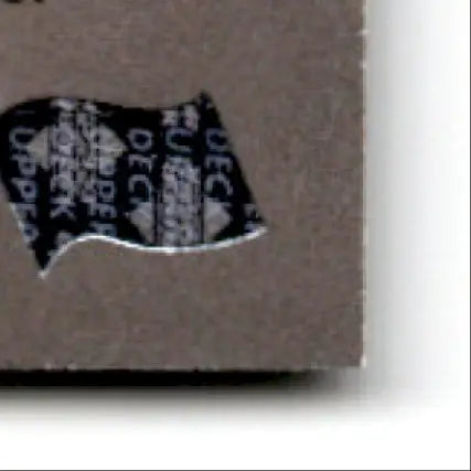 Brown rectangular card with black and white wavy security sticker from 1996 Upper Deck Racing Road to the Cup Hut Stricklin #RC33a