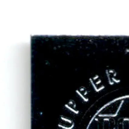 Shiny black square object with circular design from 1996 Upper Deck Racing Road to the Cup Jeff Fuller #RC48a