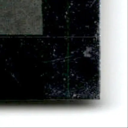 Scratched textured black surface with faint green line from 1996 Upper Deck Racing Cup Joe Nemechek