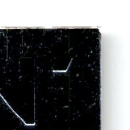 Dark textured electronic component with glowing white and green lines for Upper Deck Racing Cup Joe Nemechek