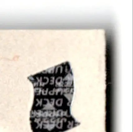 Black irregular sticker on off-white surface from 1996 Upper Deck Racing Road to the Cup Lake Speed card