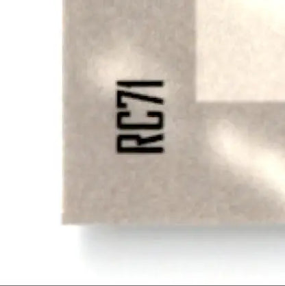 Cream-colored rectangular block with RC71 text in 1996 Upper Deck Racing Road to the Cup Lake Speed product